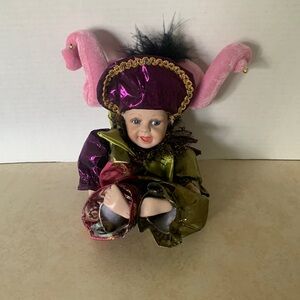 Vintage porcelain jester baby